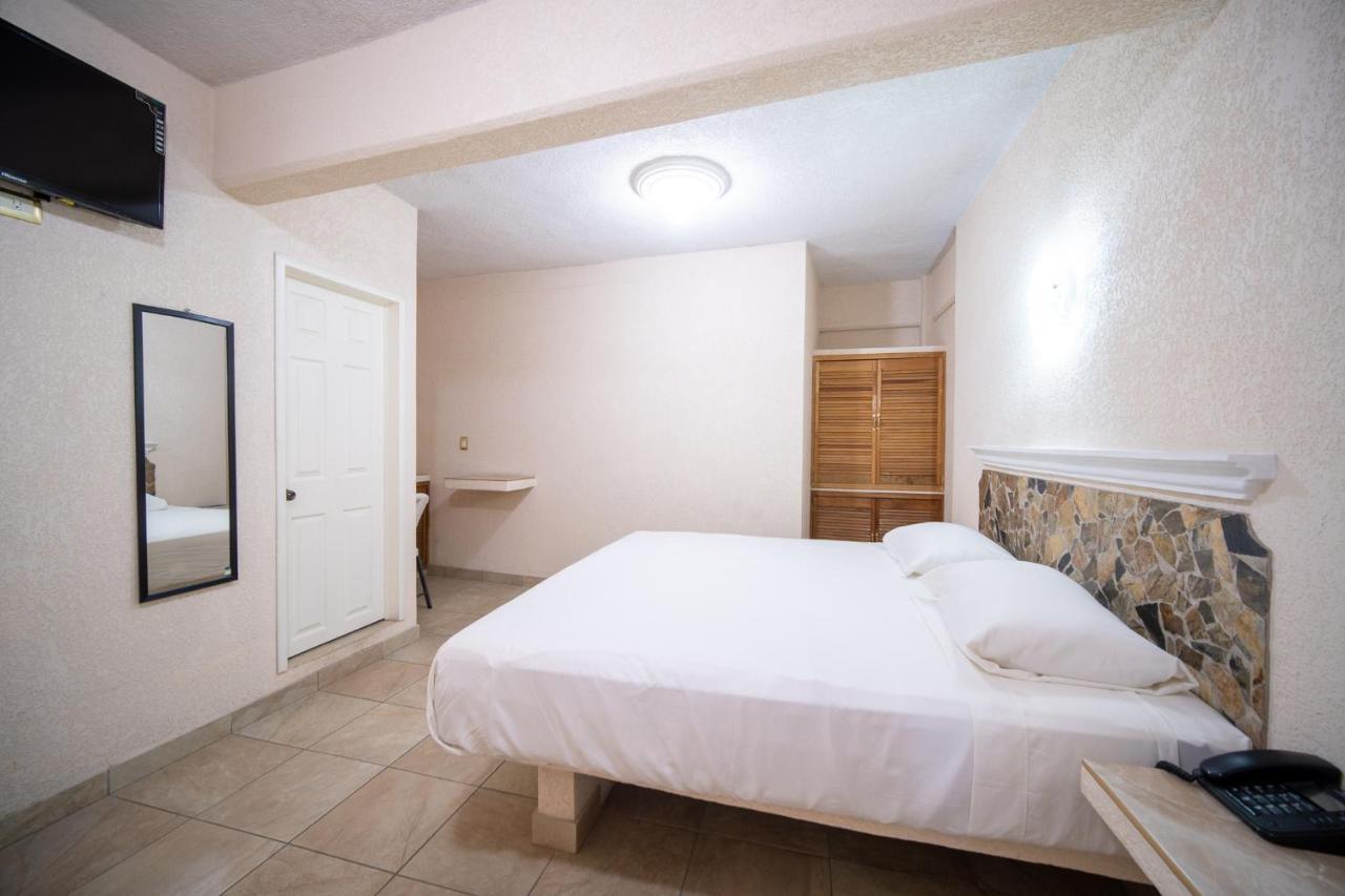 Peninsula Stays Executive Hotel Салина-Крус Экстерьер фото